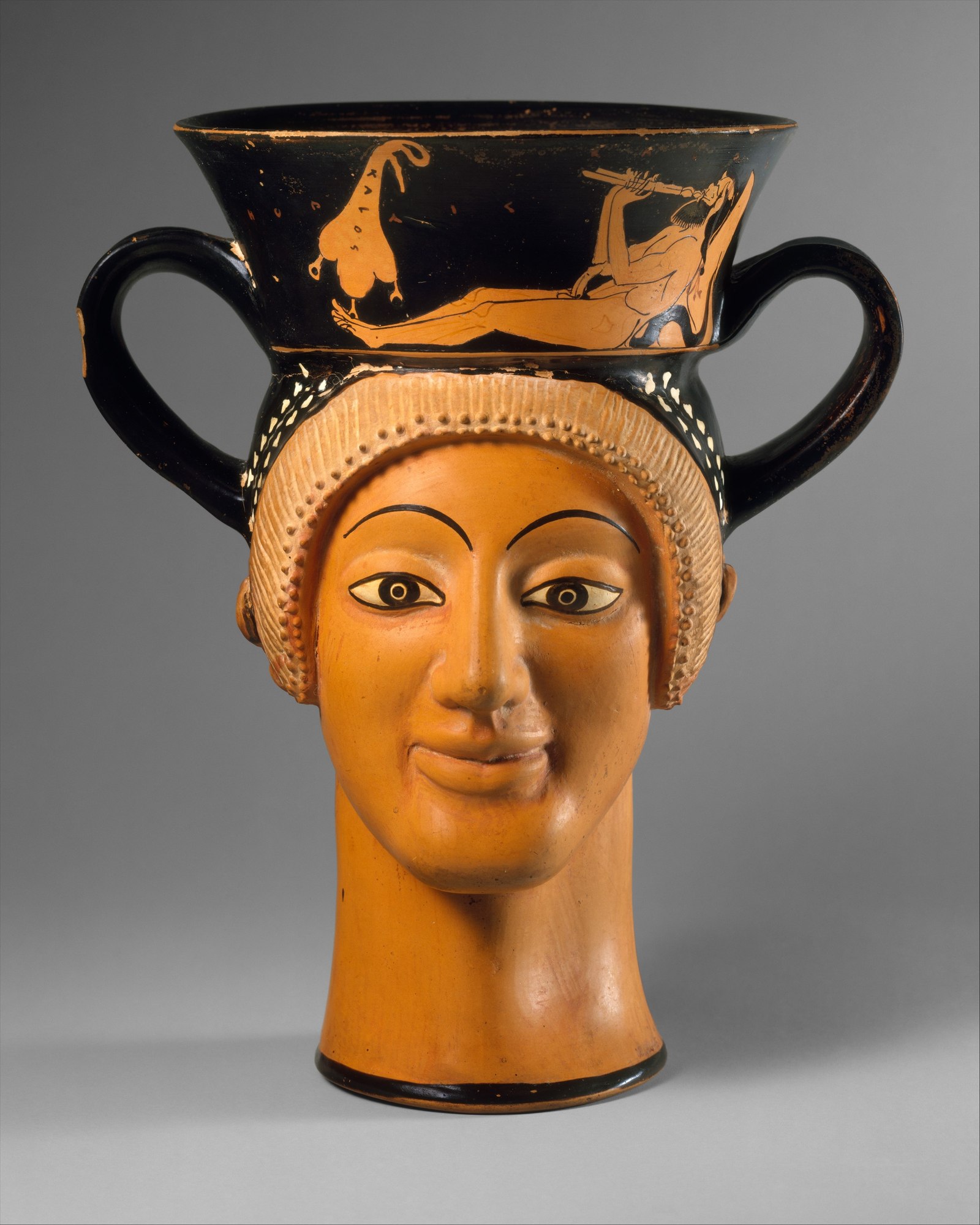Greek kantharos in the form of two female heads
