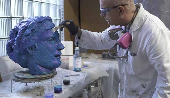 George Petrides applying colour to a related head in the studio. Catalogue figure 8, p. 33. Image courtesy George Petrides.